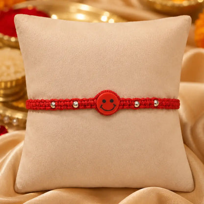 Joyful Red Smiley Rakhi in Silver