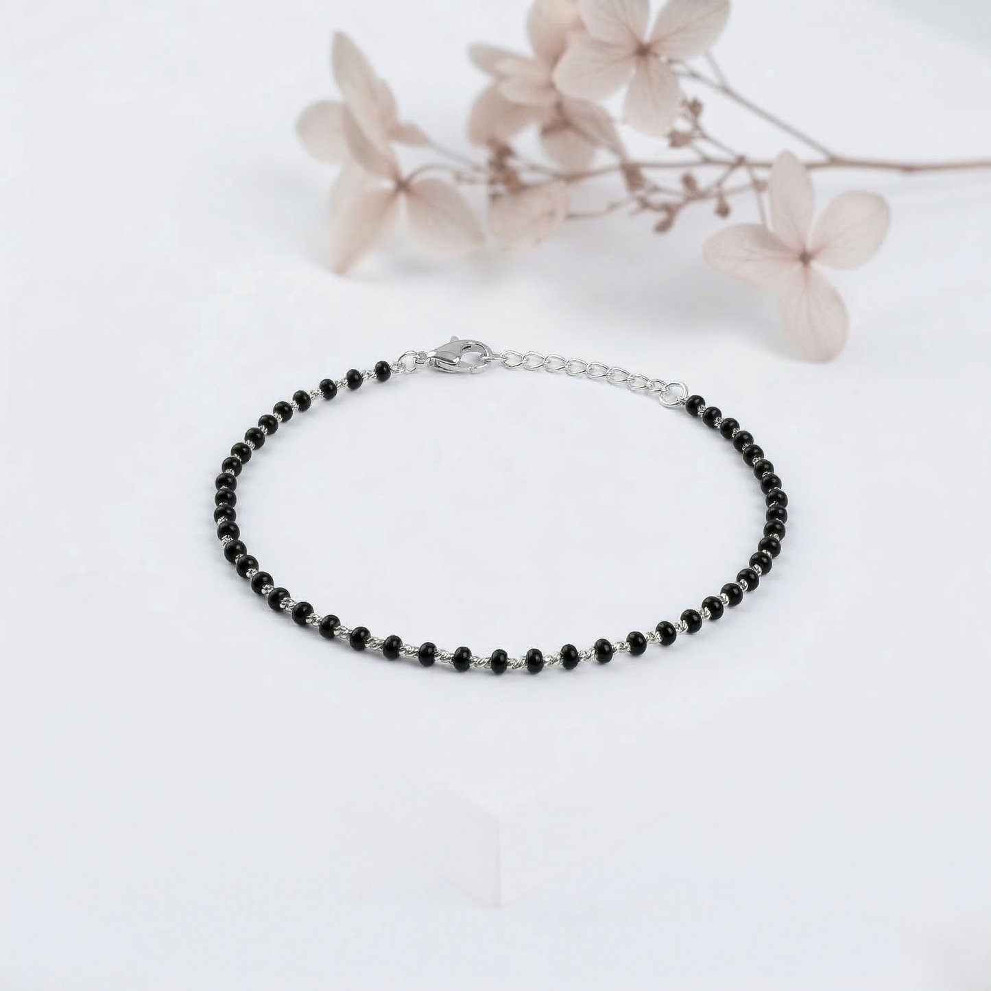 Black Beads Round Moti Silver Bracelet