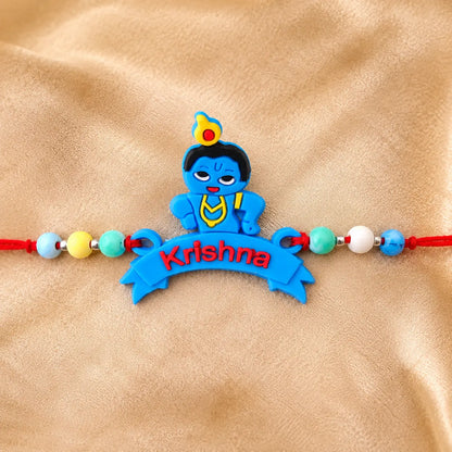 Cute Krishna Rakhi for kids with colorful beads and red thread