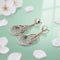 Layered Teardrop Silver Dangle Earrings with a Unique Textured Pattern