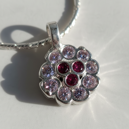 Minimal Silver Floral Pendant with Ruby Touch