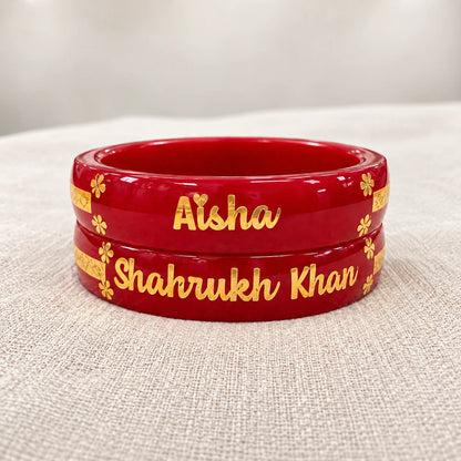 Personalized_Red_Name_Bangles_with_Golden_Floral_Custom_Name_Design