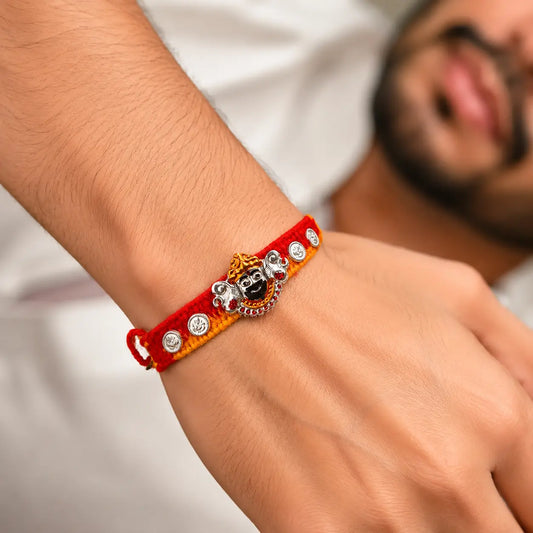 Premium Khatu Shyam Ji Designer Rakhi with Silver Ganesh Coin Charms, Dual Tone Gold Finish, Red and Yellow Handmade Cotton Thread for Raksha Bandhan Brother Gift
