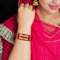 Red Designer Bangles with Elegant Golden Swirl & Floral Motifs