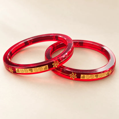 Red Designer Bangles with Elegant Golden Swirl & Floral Motifs
