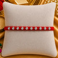 Red Silver Rakhi with Elegant Silver Beads