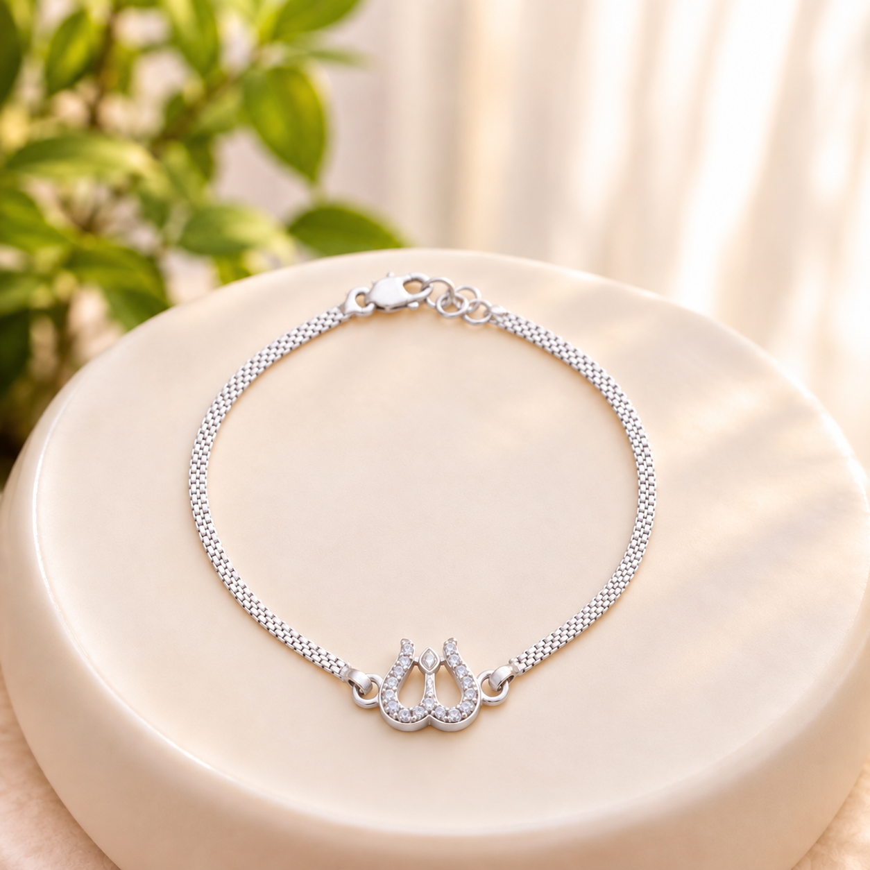 Silver Trishul Bracelet with stone-studded Shiva design on a pastel blue background