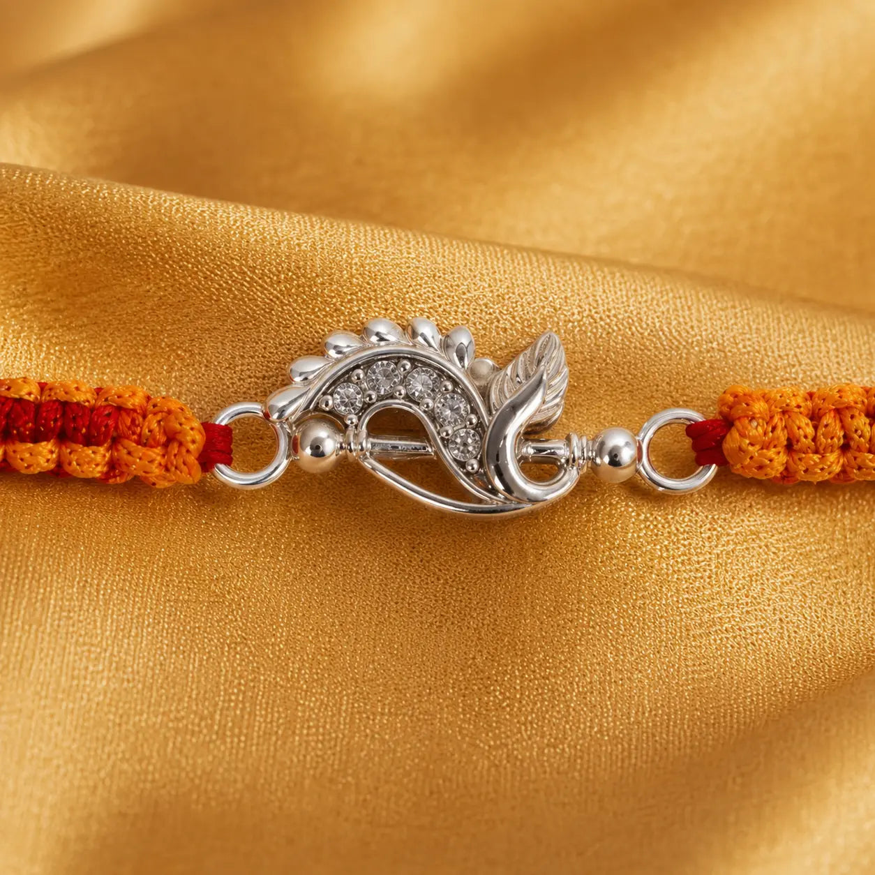  Sterling Silver Krishna Flute Rakhi with Peacock Feather Design and Handmade Orange Red Sacred Thread for Raksha Bandhan