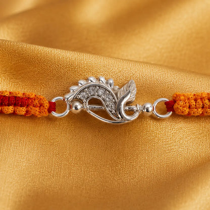  Sterling Silver Krishna Flute Rakhi with Peacock Feather Design and Handmade Orange Red Sacred Thread for Raksha Bandhan