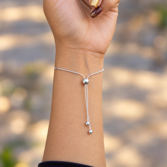 Silver butterfly bracelet with blue stones