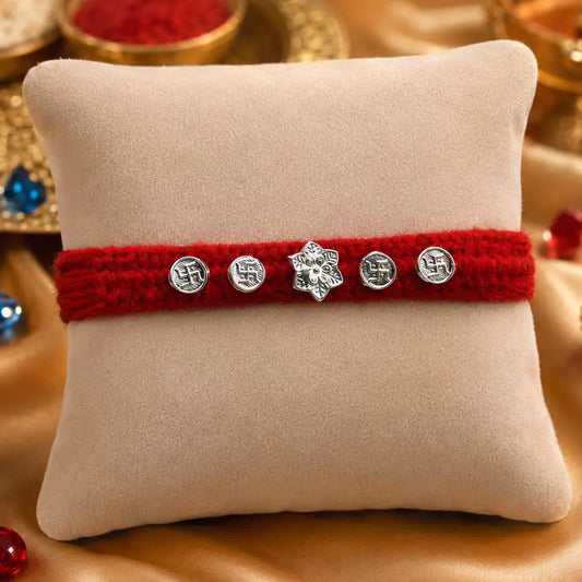 Silver Center Flower with Swasthik Rakhi for Boys