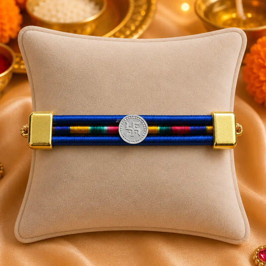 Silver Center Swasstika with Blue Ribbon Rakhi for Boys
