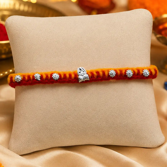 Silver Center Trishul with Flower Design Beads Rakhi for Boys