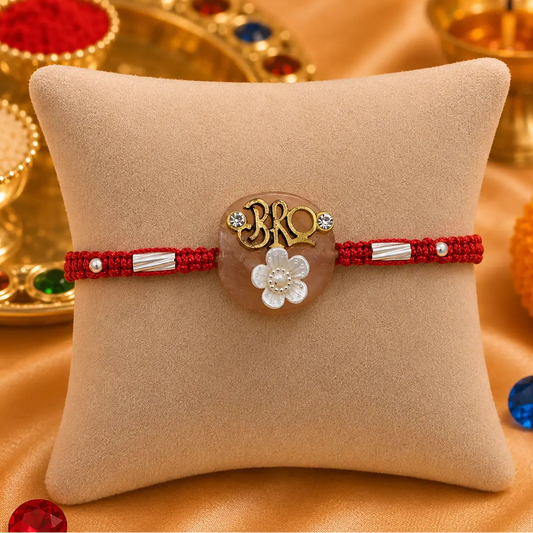 Silver Center Written Bro with White Flower Rakhi for Boys