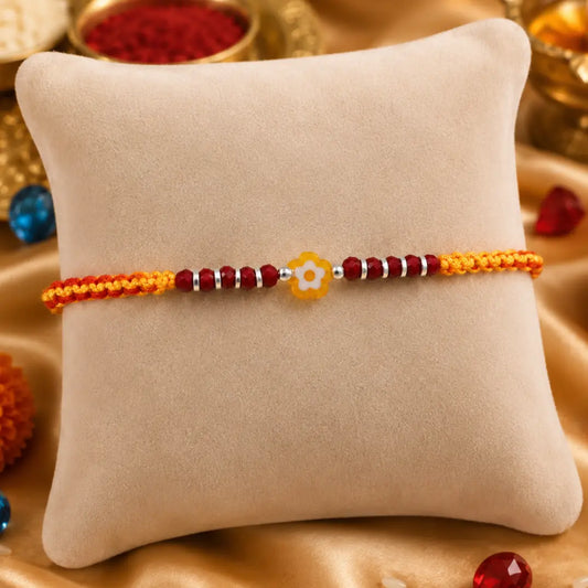 Silver Center Yellow Flower with Silver and Light Red Beads Rakhi for Boys