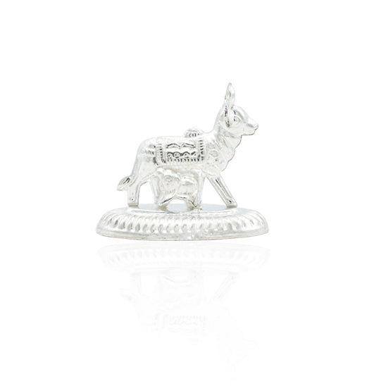 The Silver Cow is a must-have accessory for any modern cow lover. Made from high-quality silver, this elegant cow figurine is a testament to craftsmanship and attention to detail. Add a touch of sophistication to your home or office with the Silver Cow.