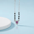 Silver Mangalsutra Adorned with a Stunning Purple Stone