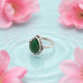 Silver Motif Of Green Crush Ring