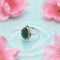 Silver Motif Of Green Crush Ring