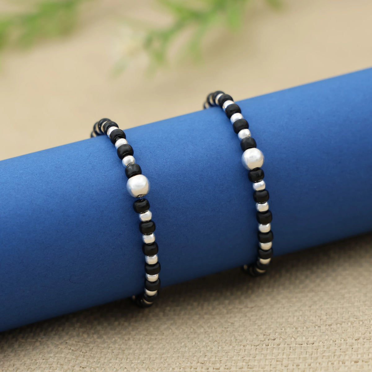 Silver Plain Moti & Black Buds Bracelet for women
