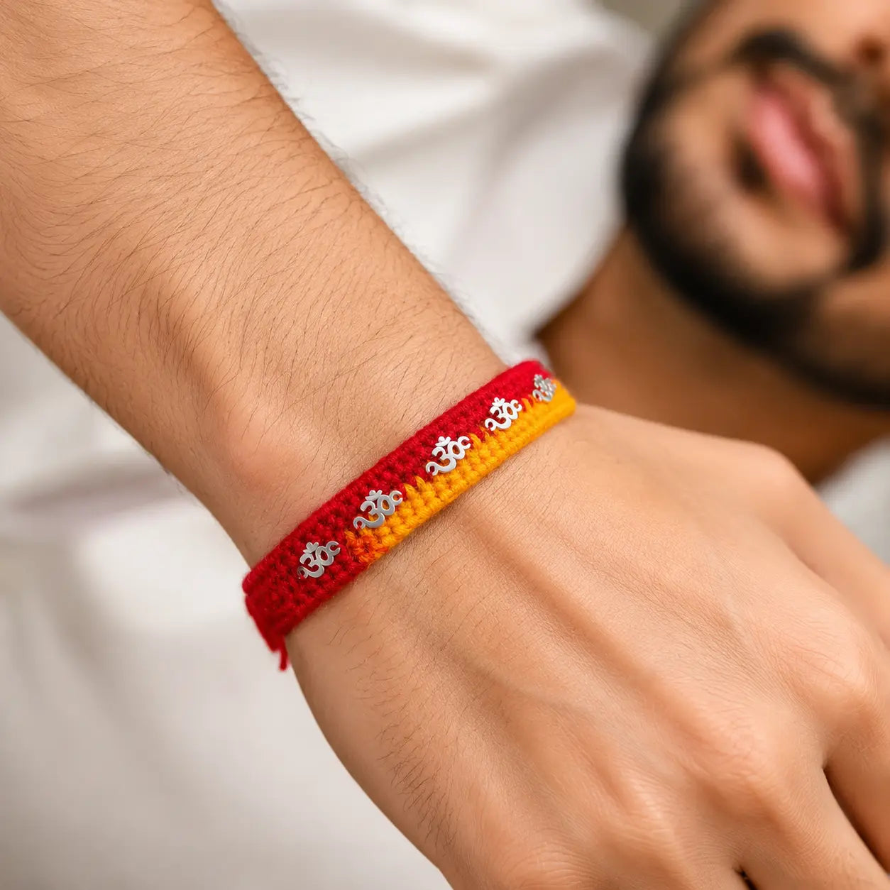 Silver Rakhi with Om Charm