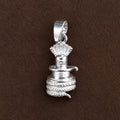 Silver Shivling pendant with cobra hood and coiled Naag design on a dark brown textured background