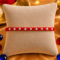 Silver Small Flower Design with Orange Thread Rakhi for Boys