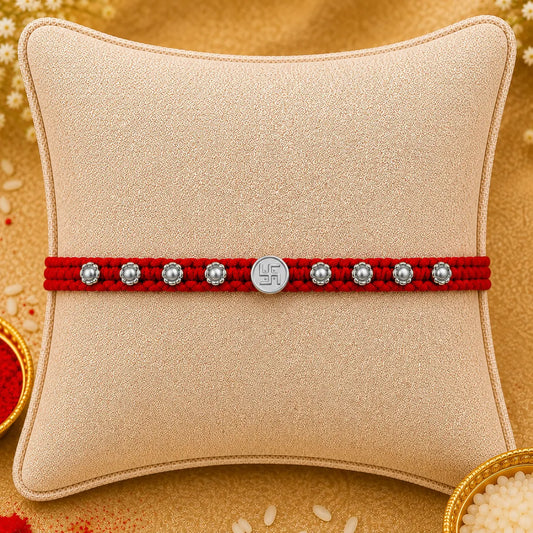 Silver Swastik Rakhi with Red Thread