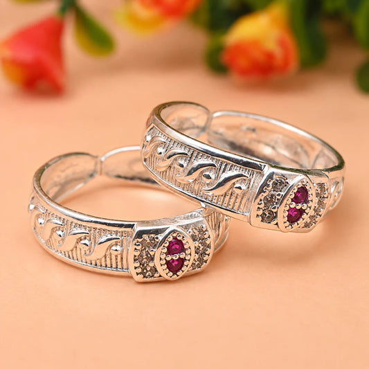Silver Toe Ring with Intricate Detailing and Pink Stone