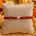 Silver_Two_Green_Evil_Eye_Rakhi_for_Boys