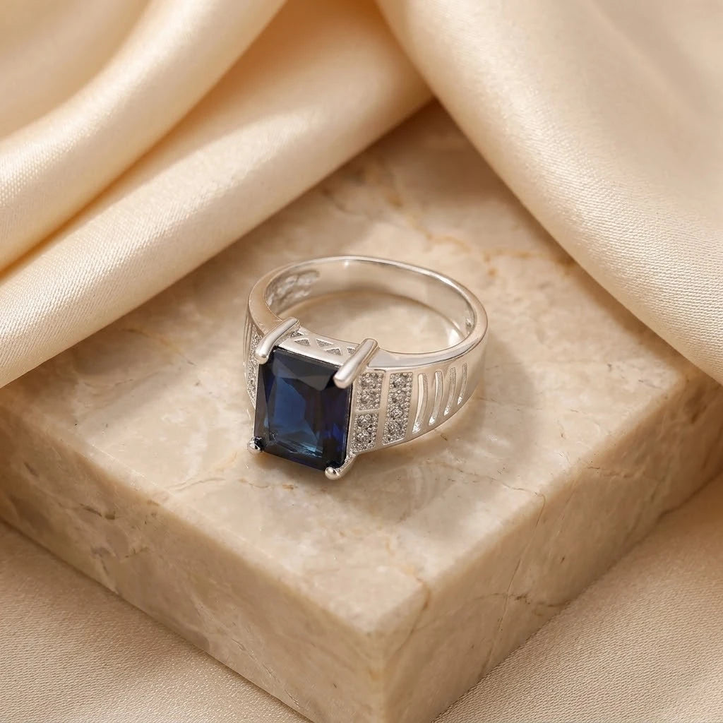 Sleek Silver Ring for Men with a Bold Blue Stone