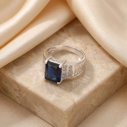 Sleek Silver Ring for Men with a Bold Blue Stone