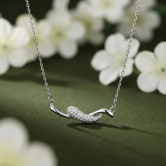 Sleek and Sophisticated Silver Chain Pendant with a Curved Design
