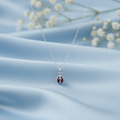 Sterling Silver Red Stone Cage Pendant
