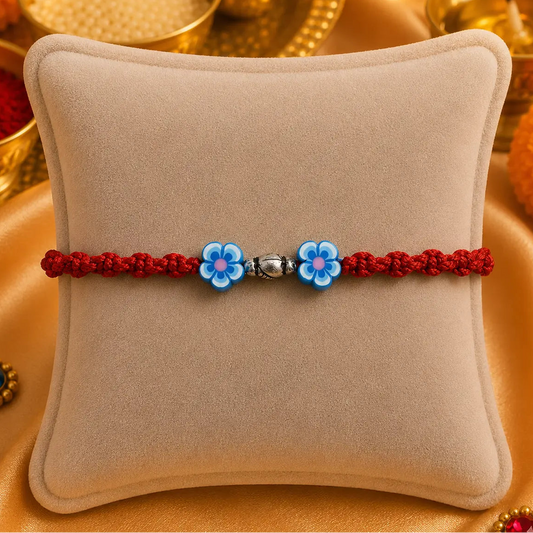 Sterling Silver Blue Flowerd Rakhi For Boys