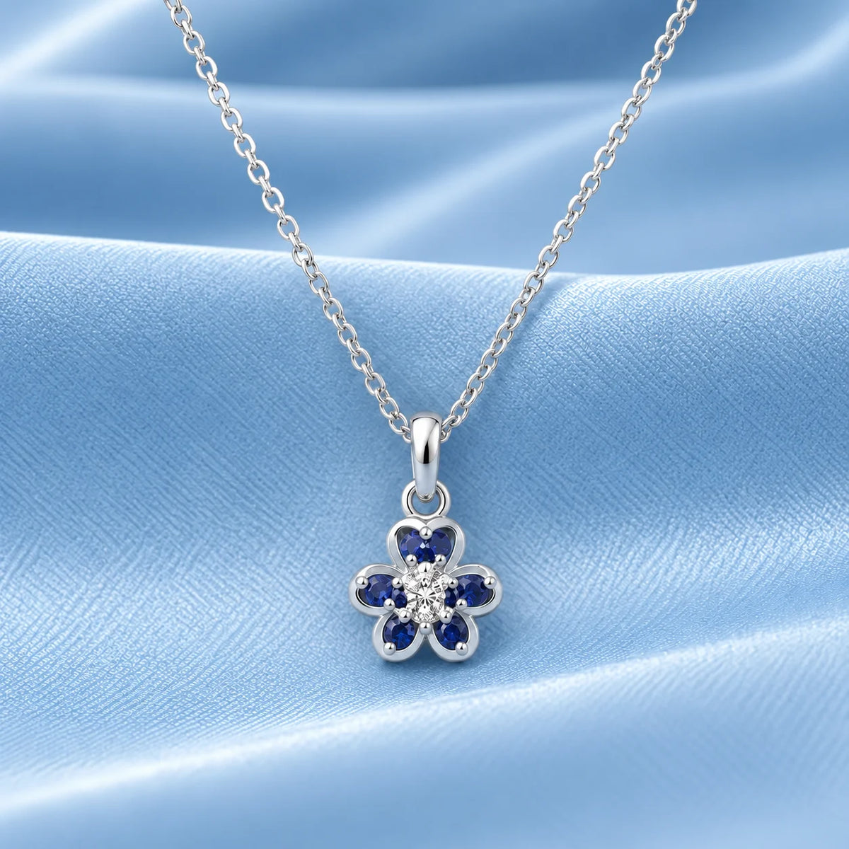 Sterling Silver Blue Stone Floral Pendant
