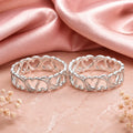 925 sterling silver adjustable heart design toe rings pair on soft pink background with luxury jewelry photography
