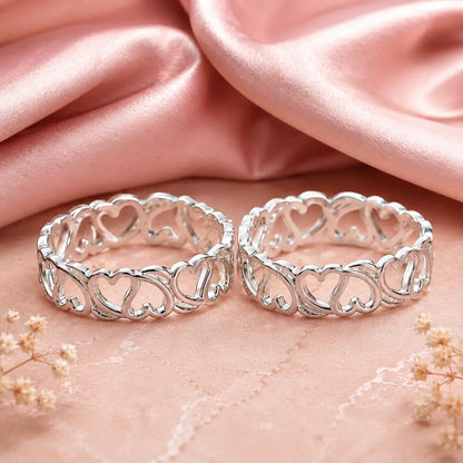 925 sterling silver adjustable heart design toe rings pair on soft pink background with luxury jewelry photography