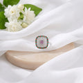 Sterling Silver Ring with Purple Stone at Center