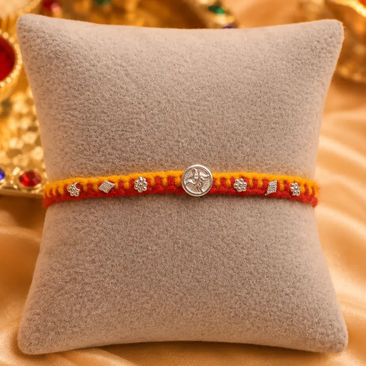 Swastik Charm Rakhi in Silver