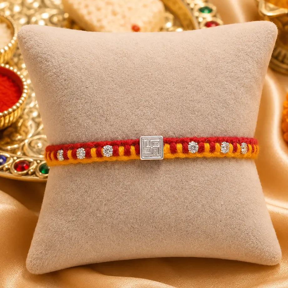 Swastik Glow Silver Rakhi Edition