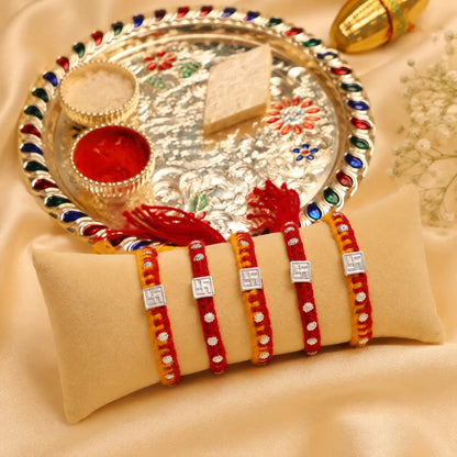 Swastik Glow Silver Rakhi Edition