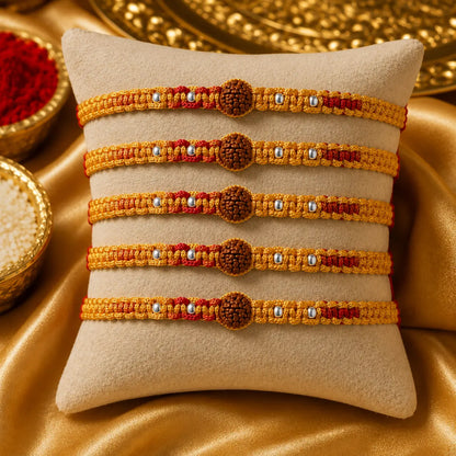 Traditional red Rudraksha Rakhi with natural Rudraksha beads and silver-tone beads