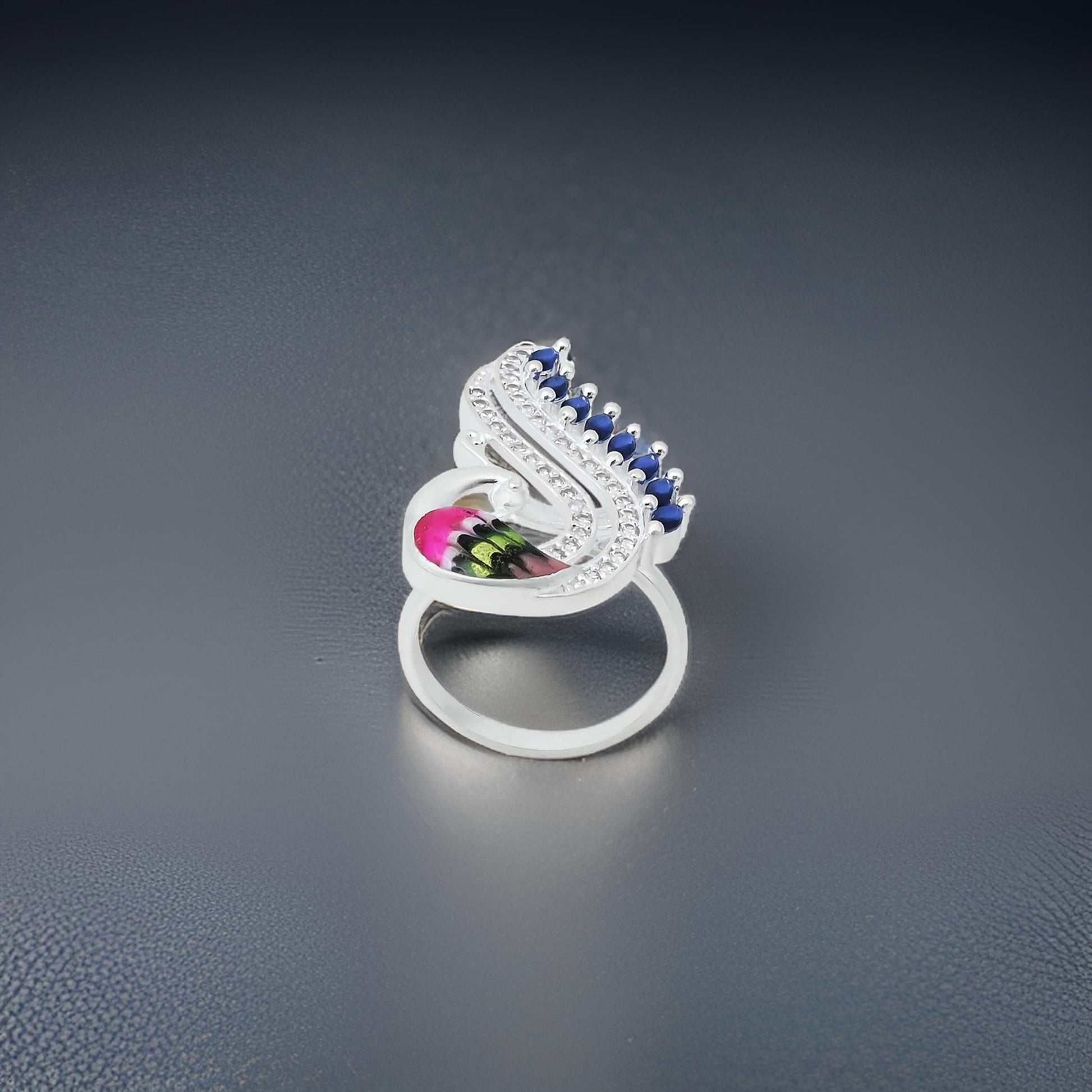 Elegant silver girls' ring with a beautiful peacock motif.