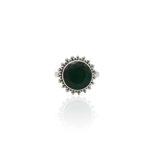 Silver ring featuring a striking green gemstone, designed to add elegance and charm for her