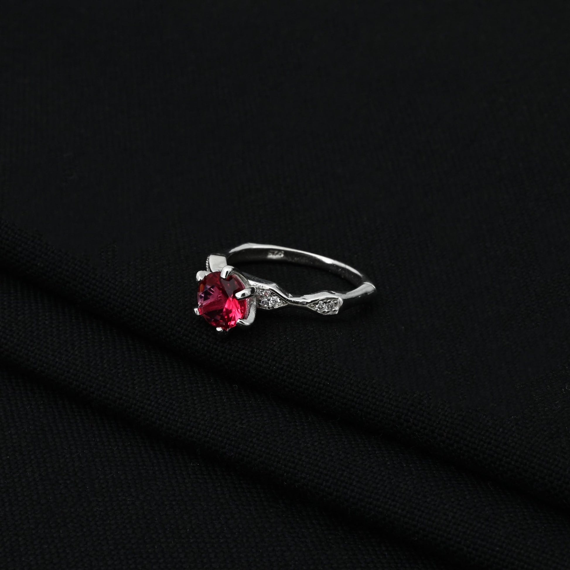 Sterling silver ring for girls, showcasing a striking blood red gemstone for a dramatic and feminine look.