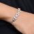 Stylish silver bracelet for girls with a delicate connecting heart motif