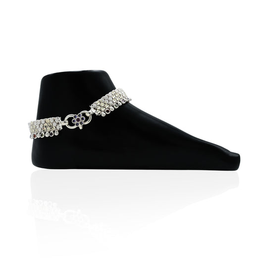 Silver anklet with a shiny finish and a sleek modern pattern