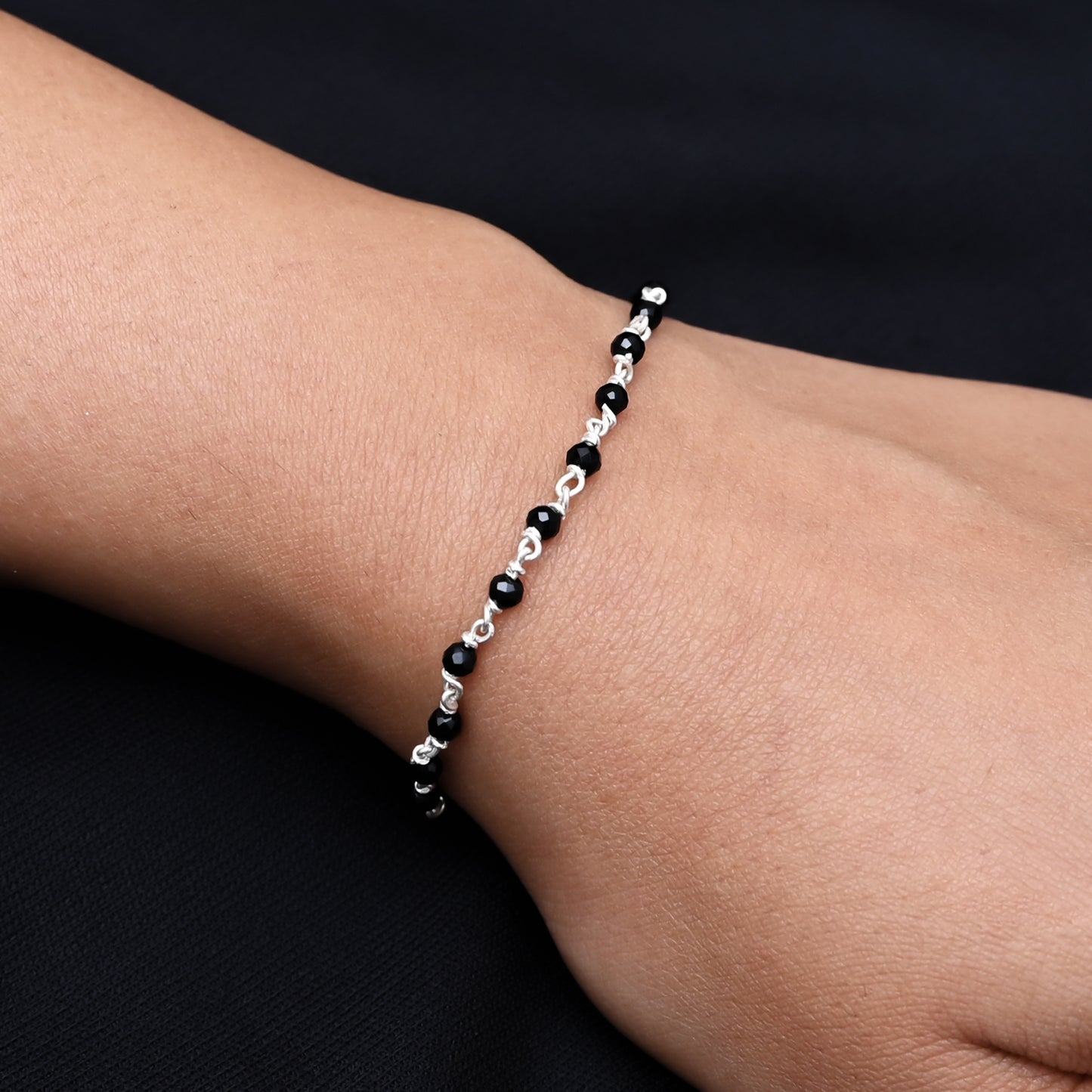 Stylish silver and black beads bracelet designed for girls, perfect for any occasion