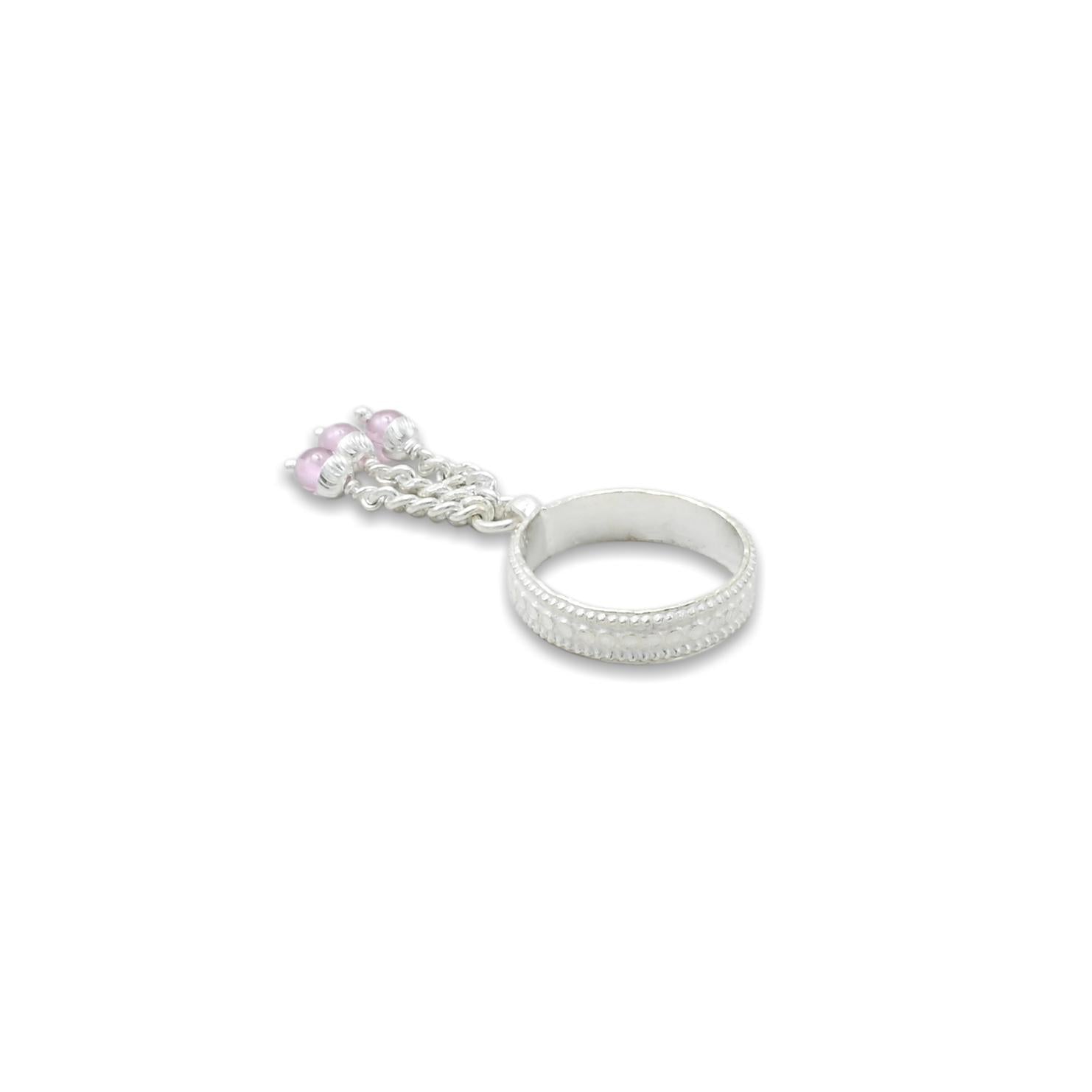 Elegant silver ring with light pink beads, offering a modern and stylish look for girls.